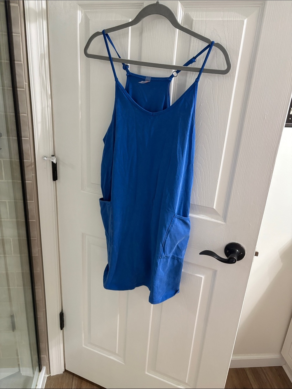 Blue Adjustable-Strap Romper with Front Pockets